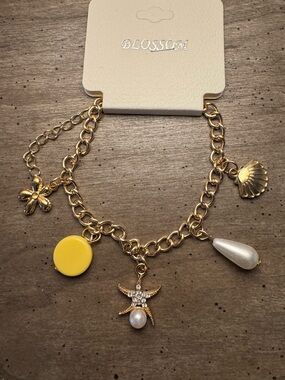 Gold Tone Beach Theme Charm Bracelet